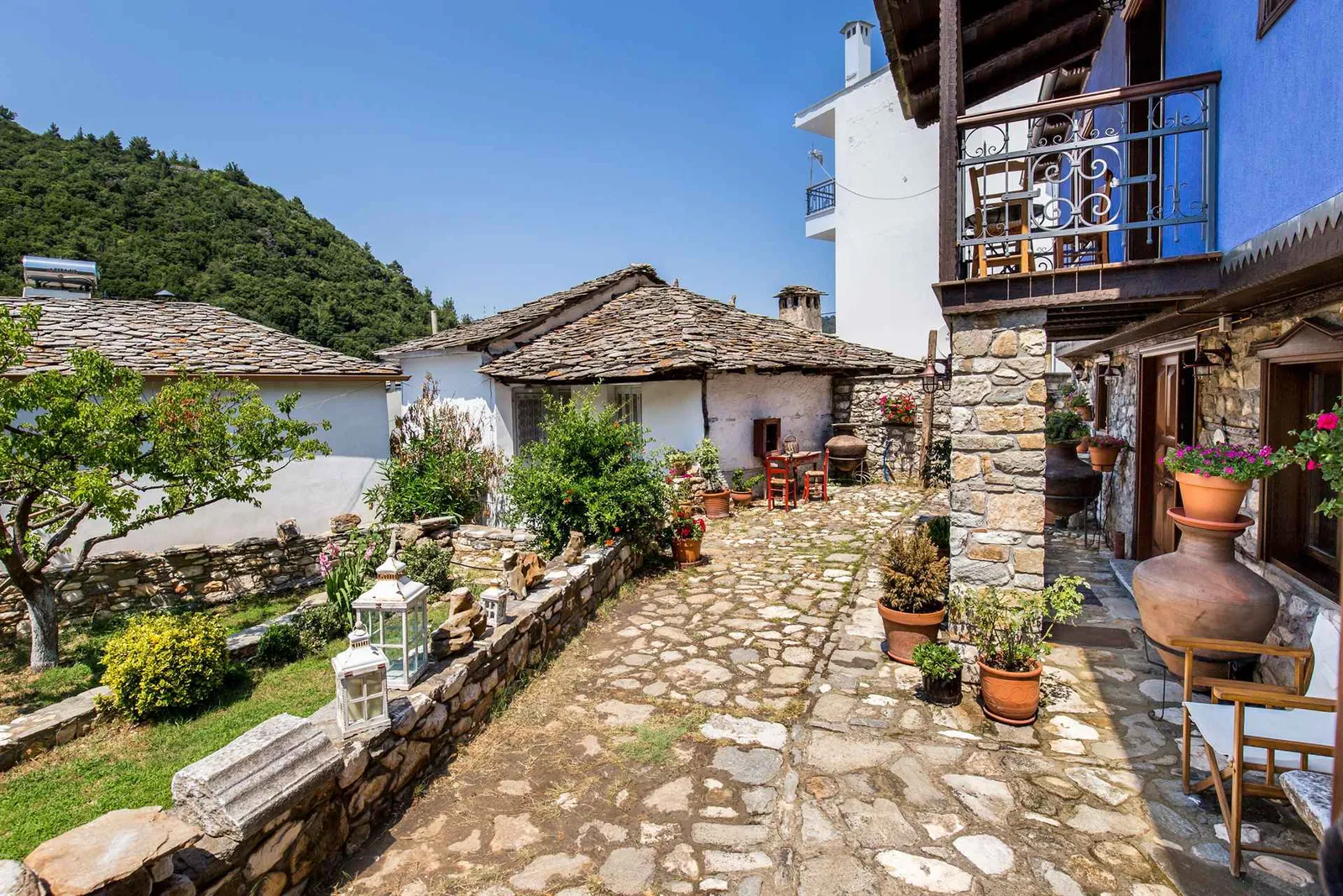Exterior, courtyard, and village view 11 at Maroyda Stonehouse in Panagia, Thassos
