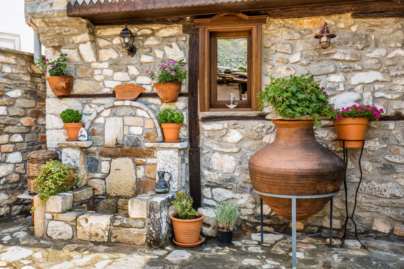Exterior, courtyard, and village view 20 at Maroyda Stonehouse in Panagia, Thassos