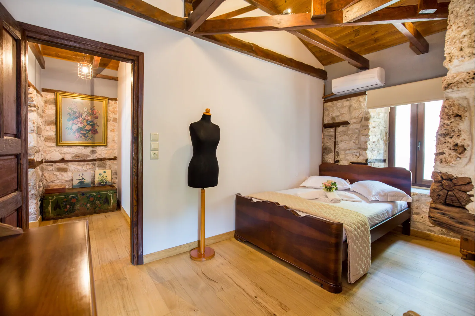 Bedroom and restored interior 7 at Maroyda Stonehouse in Panagia, Thassos