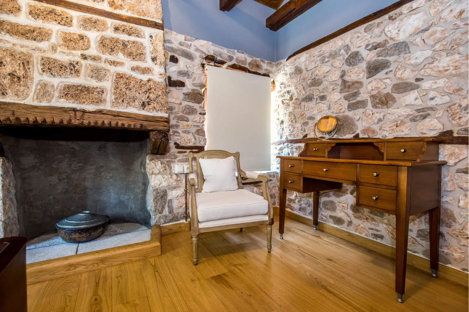 Bedroom and restored interior 5 at Maroyda Stonehouse in Panagia, Thassos