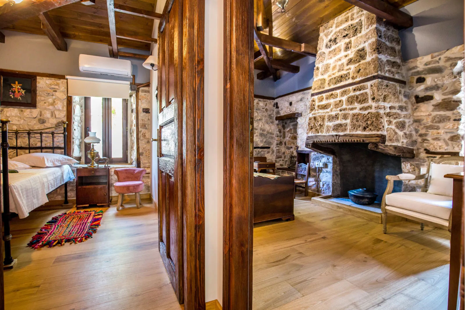 Bedroom and restored interior 17 at Maroyda Stonehouse in Panagia, Thassos