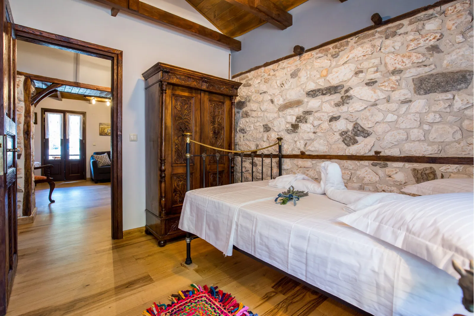 Bedroom and restored interior 13 at Maroyda Stonehouse in Panagia, Thassos