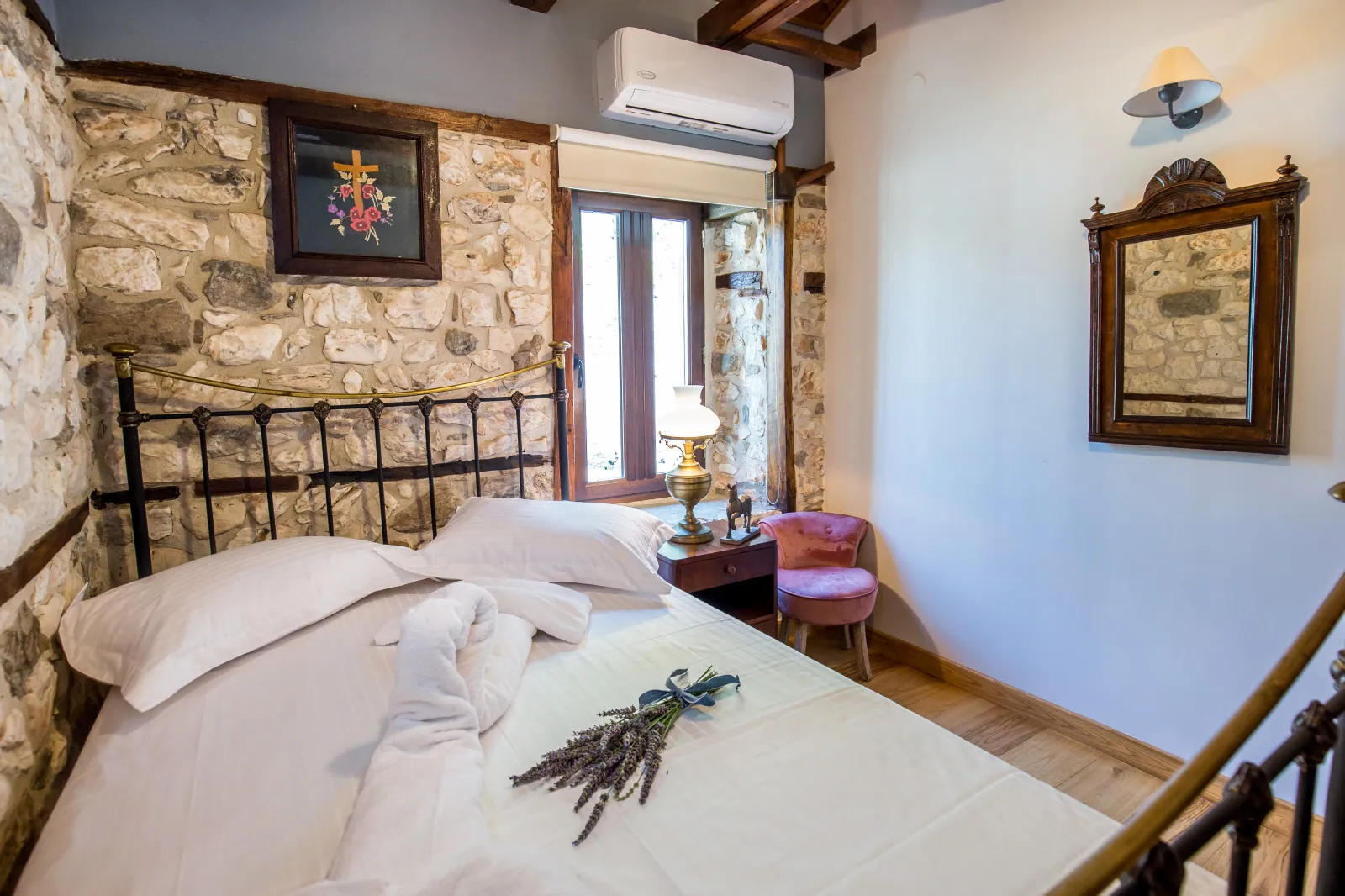 Bedroom and restored interior 9 at Maroyda Stonehouse in Panagia, Thassos