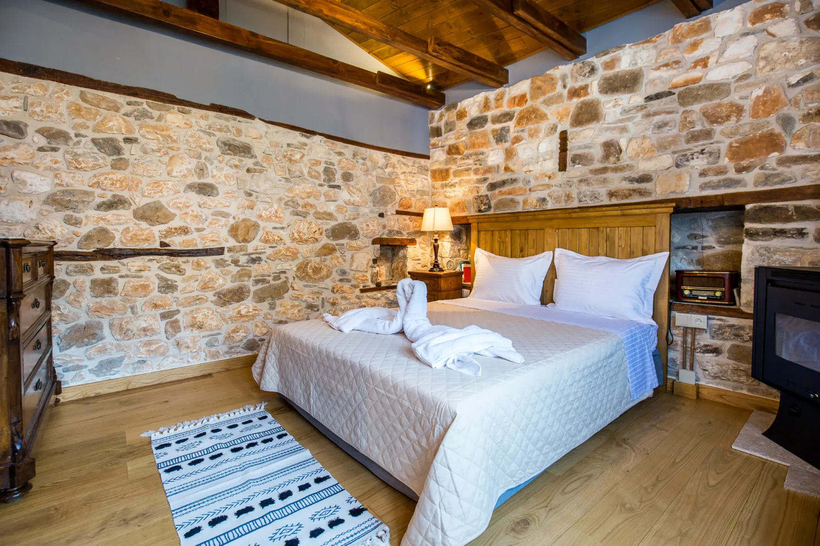 Bedroom and restored interior 2 at Maroyda Stonehouse in Panagia, Thassos