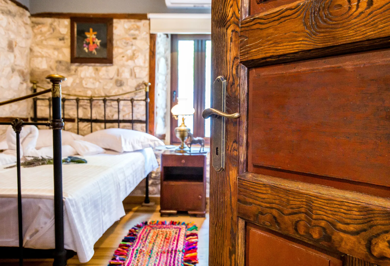 Bedroom and restored interior 15 at Maroyda Stonehouse in Panagia, Thassos