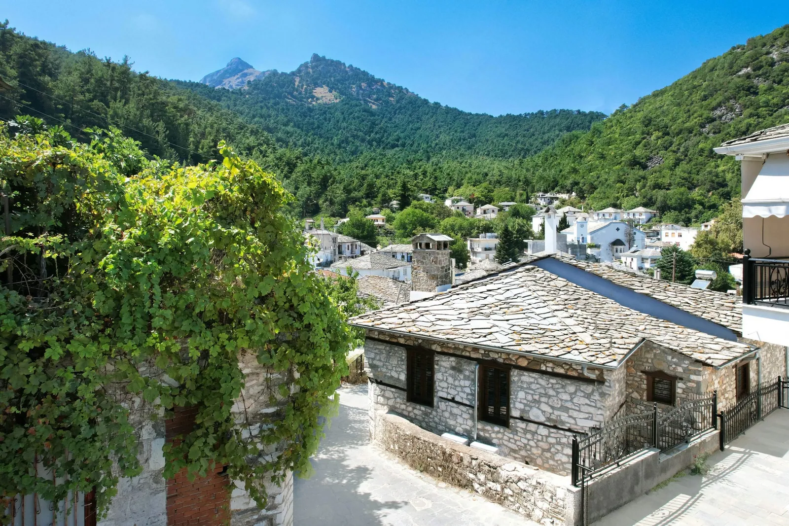 Exterior, courtyard, and village view 13 at Maroyda Stonehouse in Panagia, Thassos