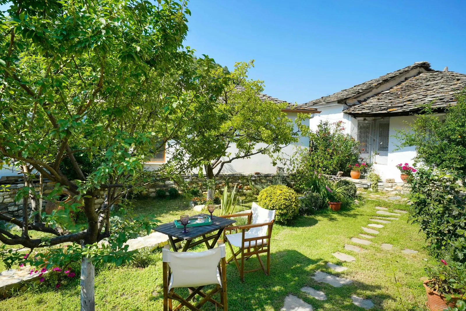 Exterior, courtyard, and village view 21 at Maroyda Stonehouse in Panagia, Thassos