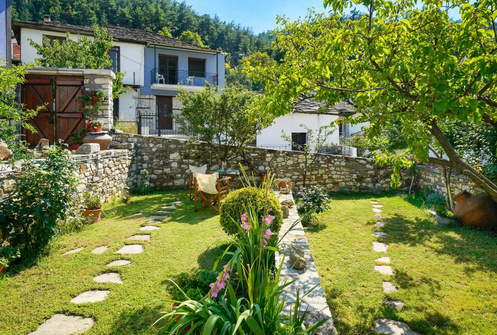 Exterior, courtyard, and village view 33 at Maroyda Stonehouse in Panagia, Thassos