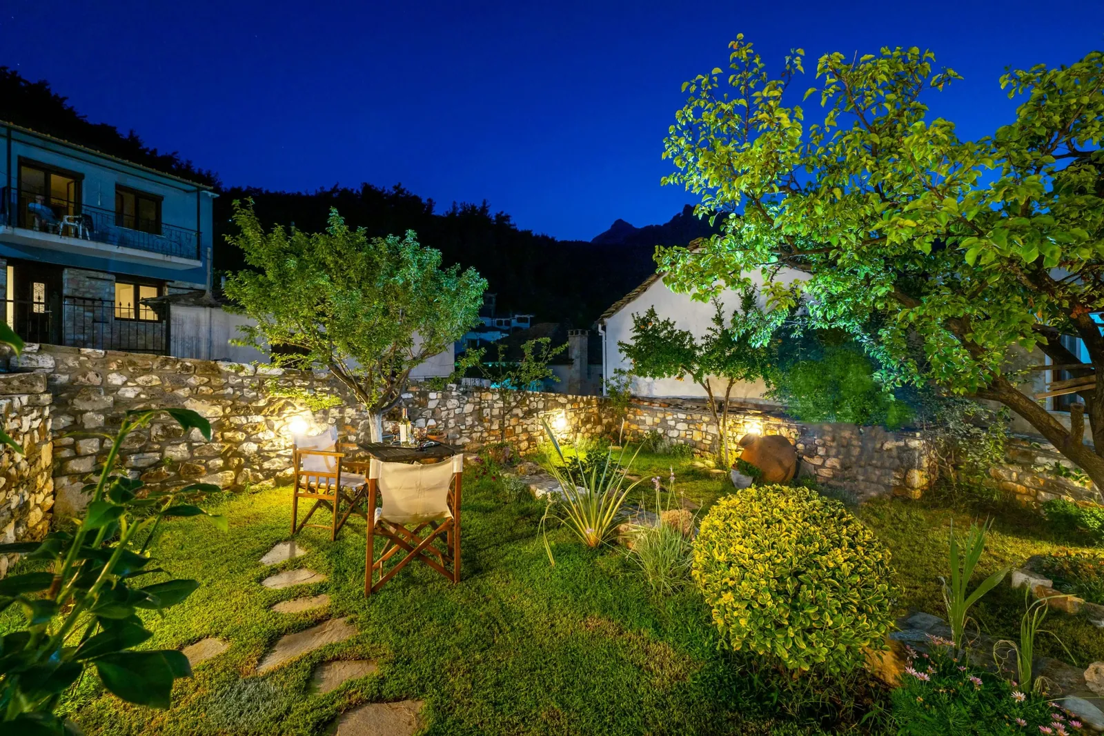 Exterior, courtyard, and village view 2 at Maroyda Stonehouse in Panagia, Thassos