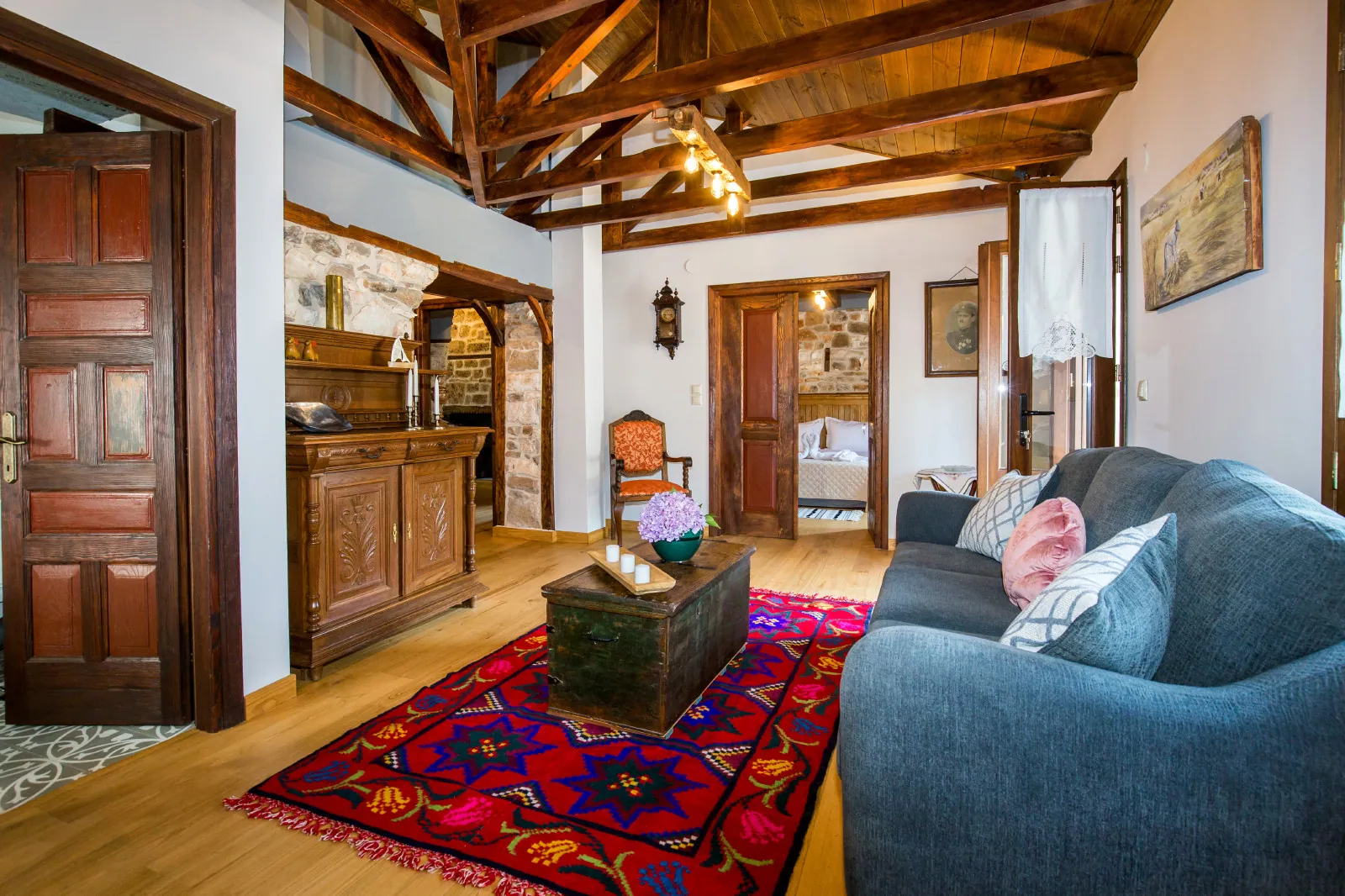 Salon with preserved details and exposed wooden beams